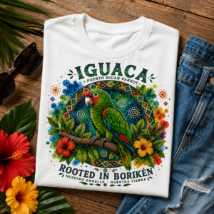 Puerto Rican Parrot T-Shirt featuring a colorful Iguaca parrot, Taíno-inspired artwork, tropical flowers, and Borikén heritage design