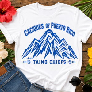 Taíno Caciques T-shirt featuring Puerto Rico mountain artwork with the names of historic Taíno chiefs including Agüeybaná, Caguax, Guarionex, Yuisa, and Orocobix.