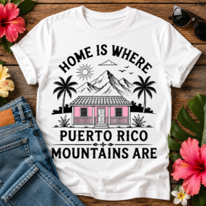 Puerto Rico Mountains T-Shirt featuring a pink island home, tropical palm trees, mountain landscape, and the quote "Home Is Where Puerto Rico Mountains Are"